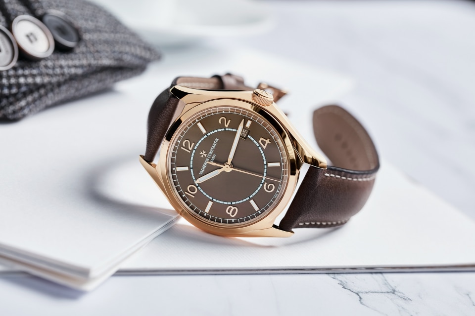 Other view - Lifestyle product photo - Watch - Fiftysix self-winding - 40 mm Pink Gold with Calfskin leather strap
