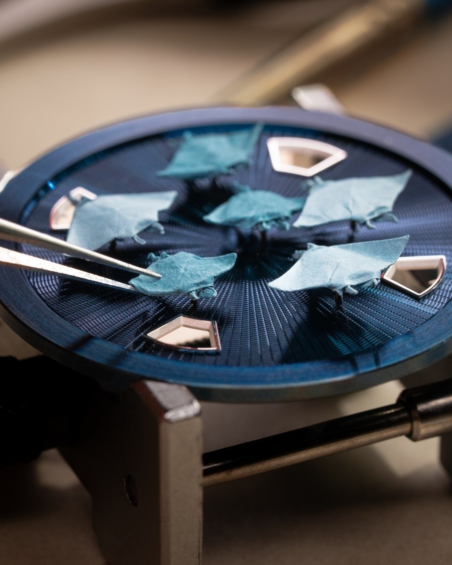 Precise process of placing micro origami creations into the Vacheron Constantin concept watch.