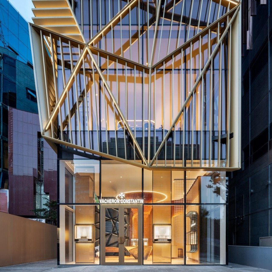Exterior view of the Vacheron Constantin boutique. It boasts an elegant facade and luxurious design, with glimpses of the surrounding environment.