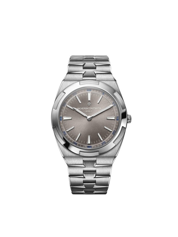 Stainless steel watch with a grey textured dial and minimalist design.