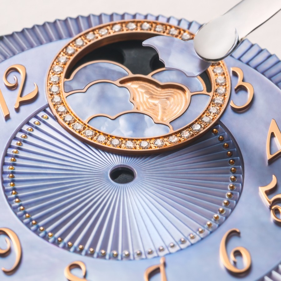 Zoom on the purple dial of an Égérie Moon phase