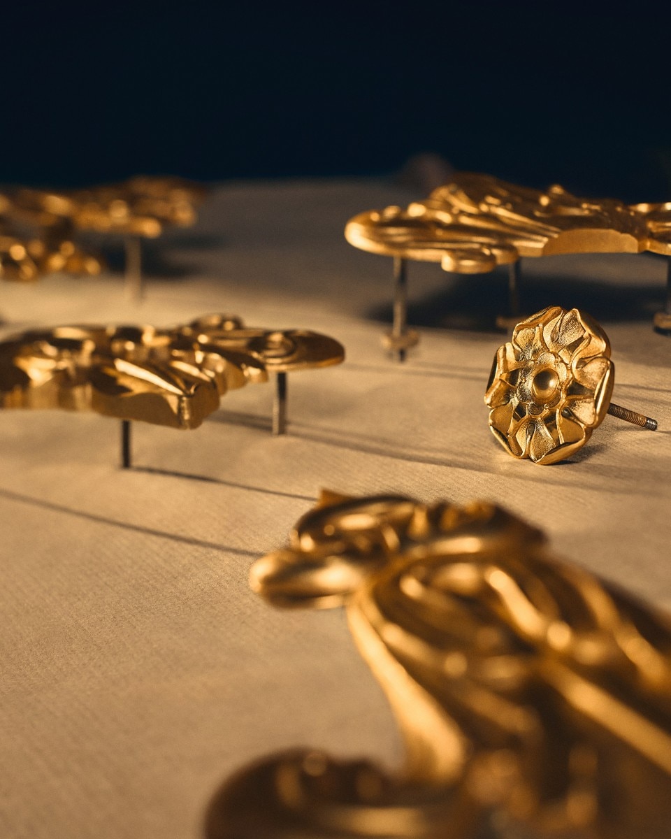 Display of intricate golden jewelry pieces.