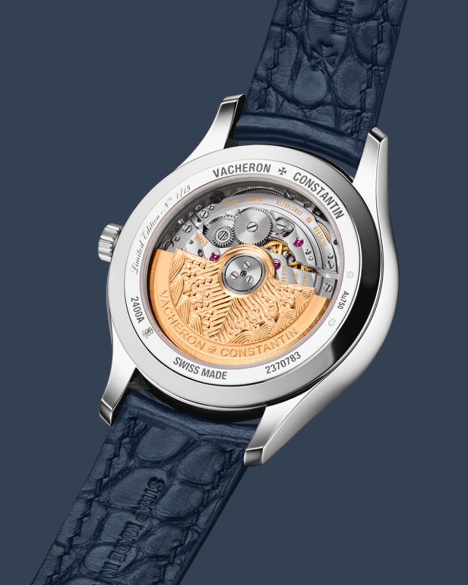 A sophisticated wristwatch with a black leather strap and luxurious details