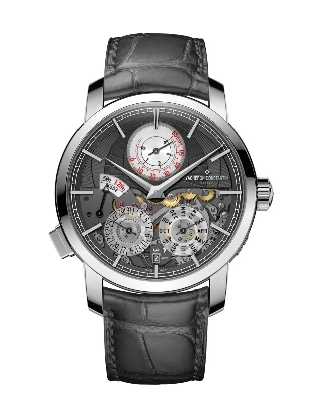 Luxury wirstwatch with a skeletonized dial showcasing intricate mechnical complications.