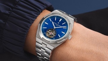 Blue dial watch with metal bracelet