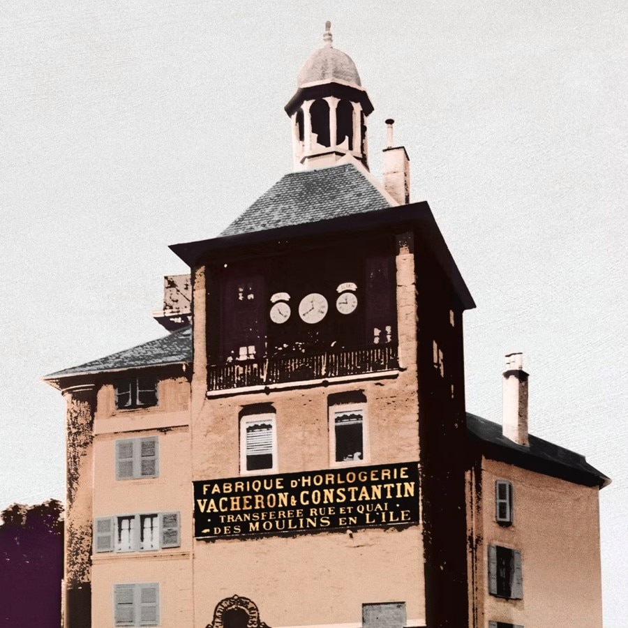 Историческое здание часовой мастерской Vacheron Constantin, часовая башня и вывеска.