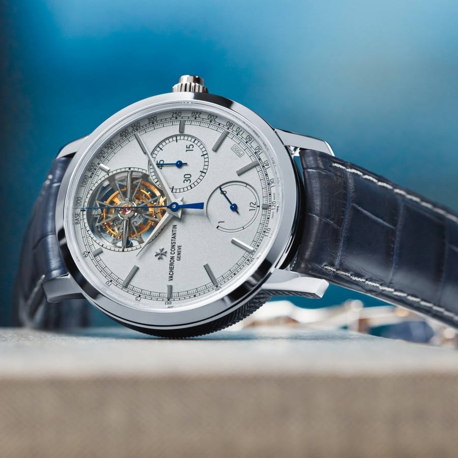 Traditionnelle tourbillon chronograph Collection Excellence Platine lying sideways on a table