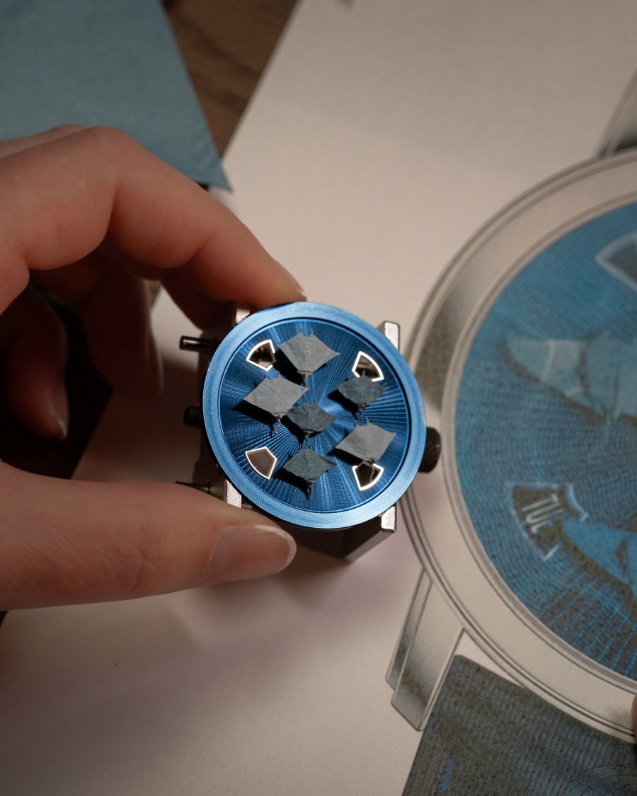 Precise process of placing micro origami creations into the Vacheron Constantin concept watch.