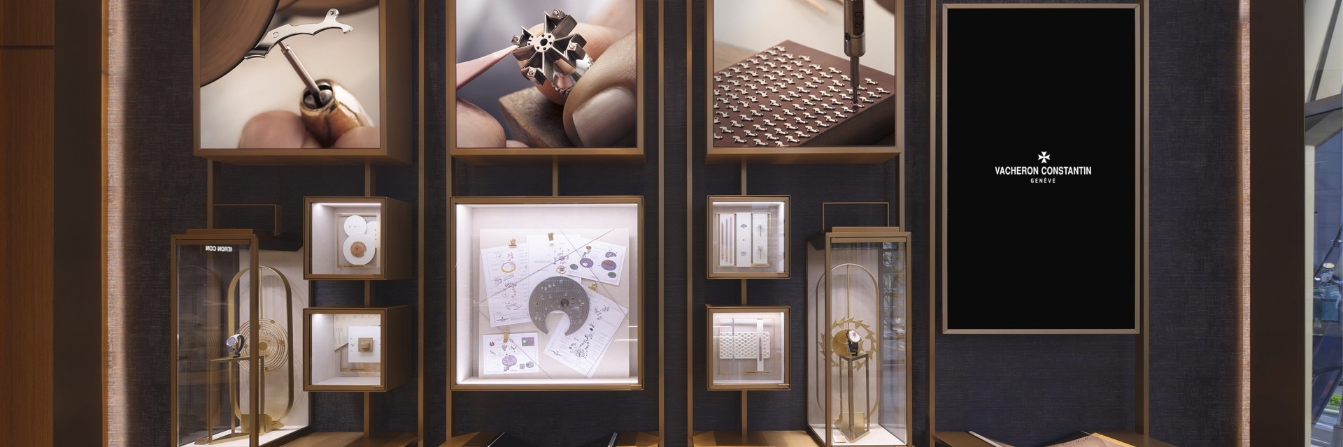 A shelf displaying exhibition sketches.