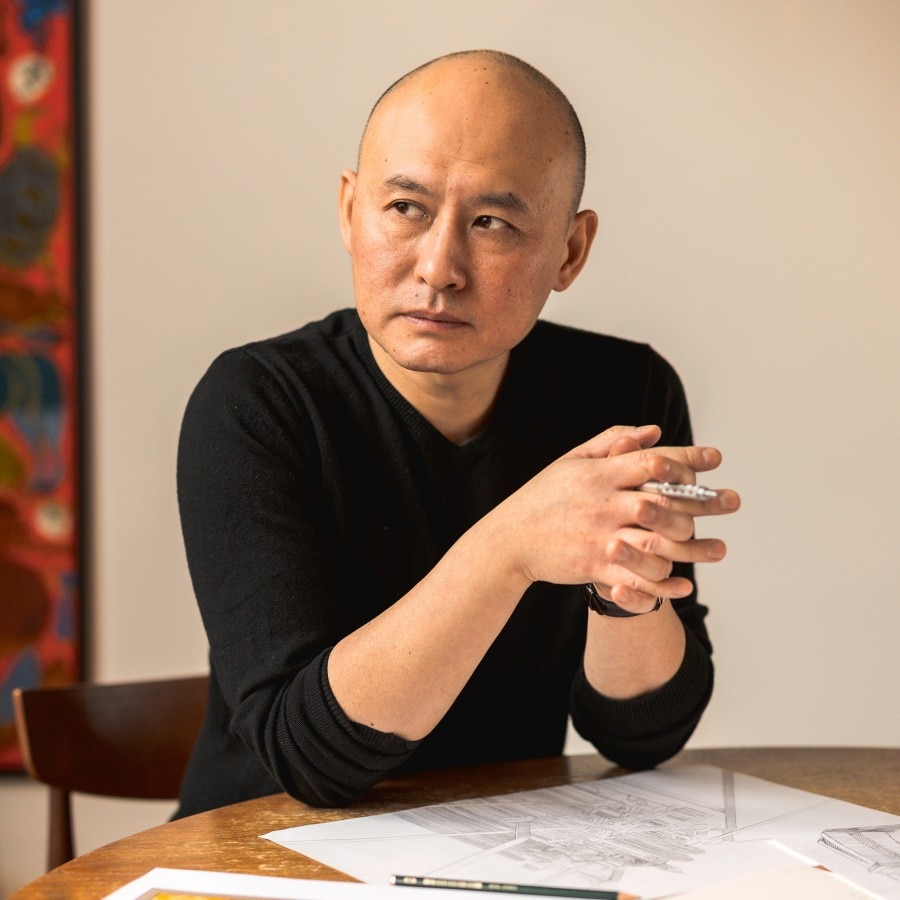The image shows illustrator Shan Jiang.