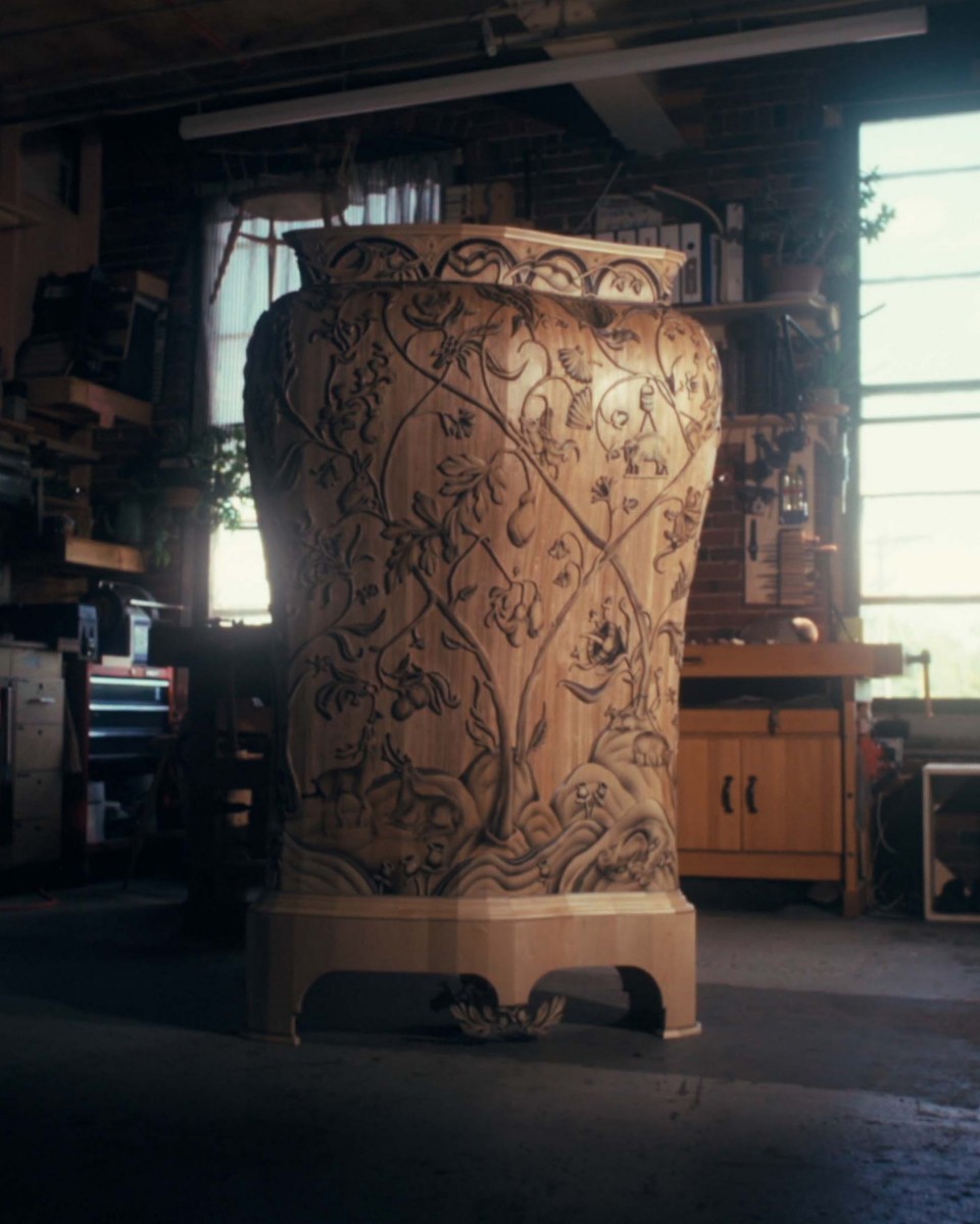Front view of the wooden monumental vases made by Aspen Golann