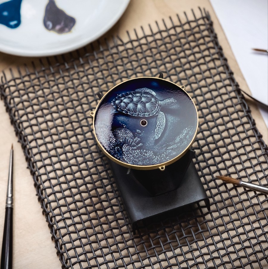 Painting a turtle on the watch dial