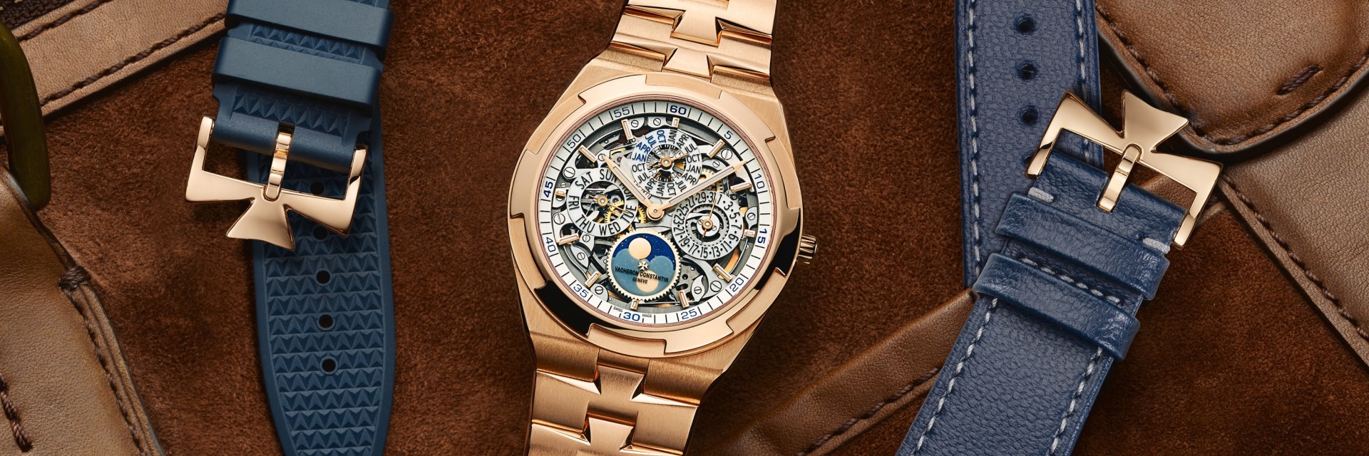 A watch between 2 types of straps on a leather floor