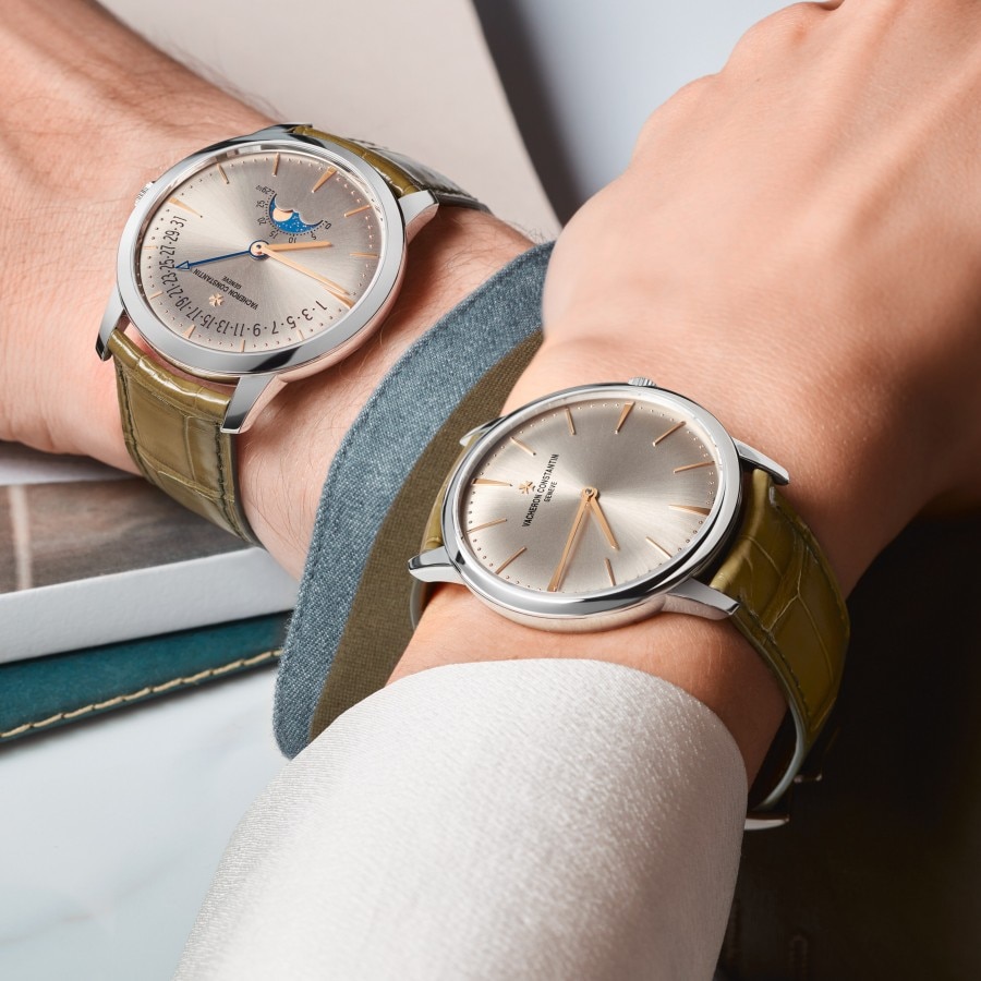 Two persons wearing Patrimony with fresh olive green color straps