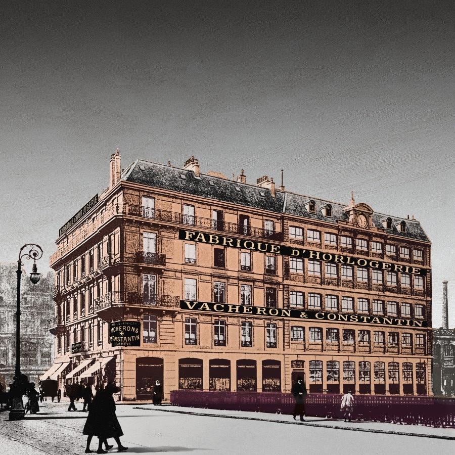 An old brown building with the text saying "Watchmaking Factory" on its facade.