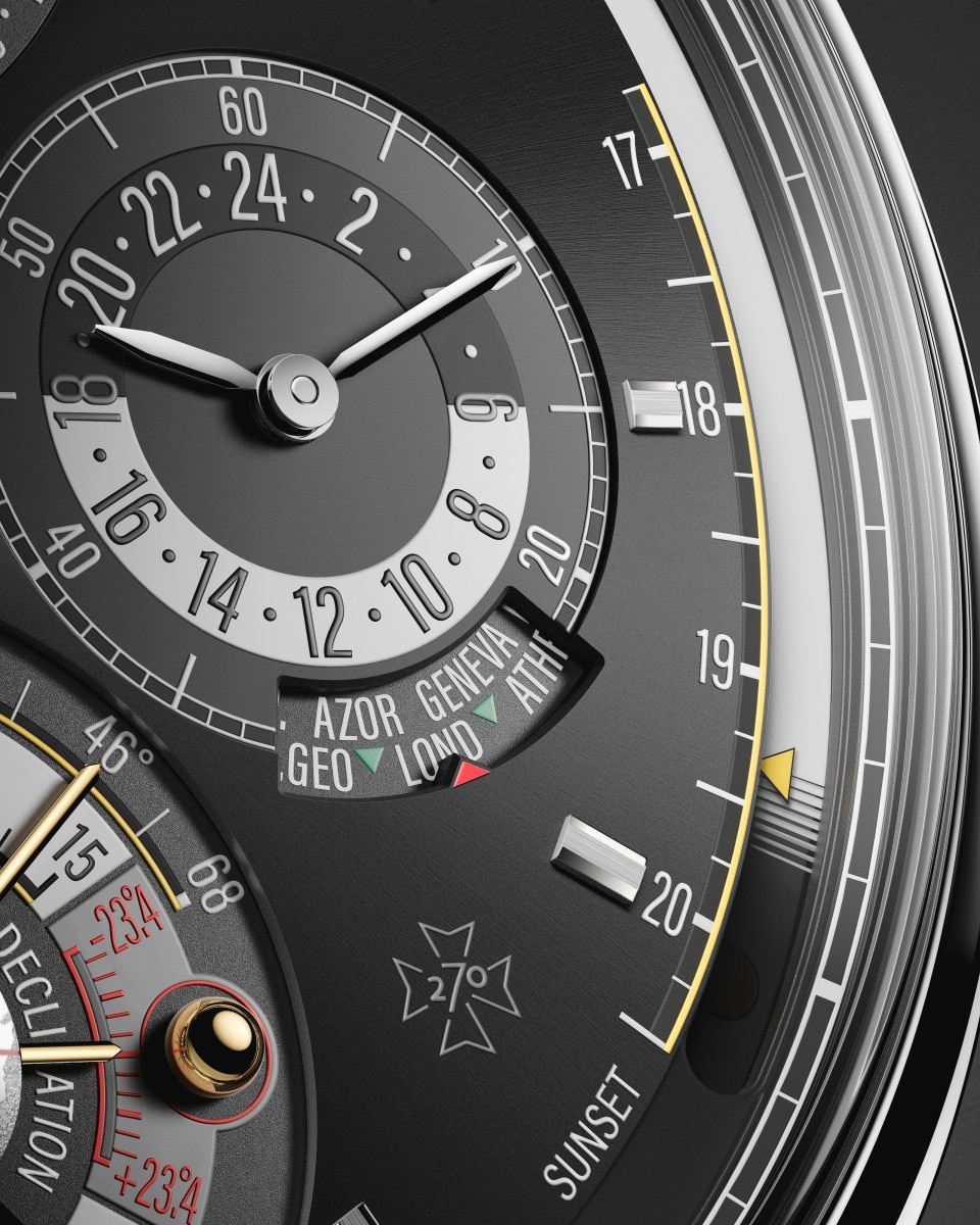 Primo piano della cassa di un orologio con lunetta nera e dettagli argentati