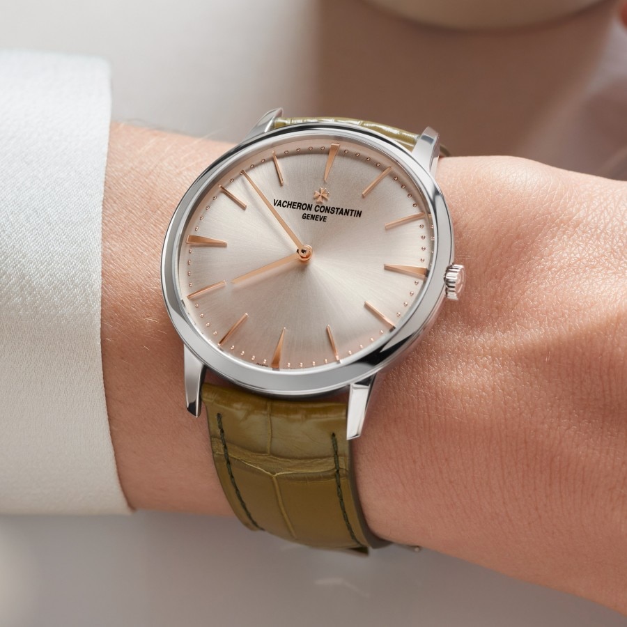 Patrimony with an olive green color strap on a wrist