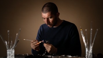 Artist working on the glass octopus concept watch.
