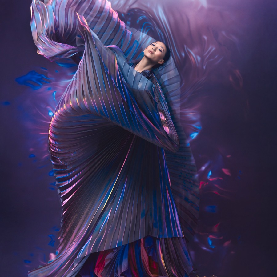 Couture designer Yiqing Yin's dancing in a Haute couture purple dress